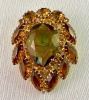 UNS14 pear shaped 2 tone amber rhinestone pin